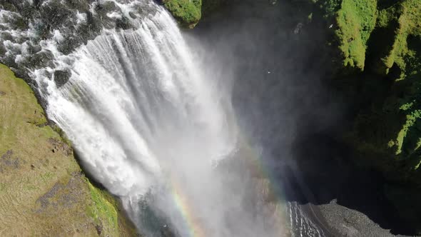 Double rainbow created by Skogafoss waterfall in Iceland, Europe (aerial view) alt