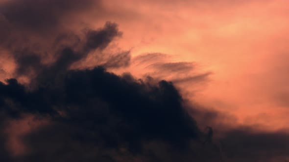 Time Lapse of Epic Sunrise Rising Above Clouds with Fiery Glow Burning Red Sun alt