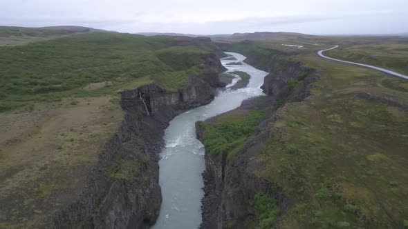 Aerial Flight over A rocky river valley in Iceland