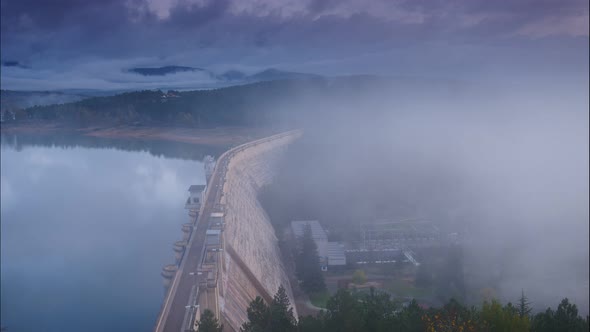 Dam on Embalse de Aguilar de Campoo, Spain. Time lapse alt