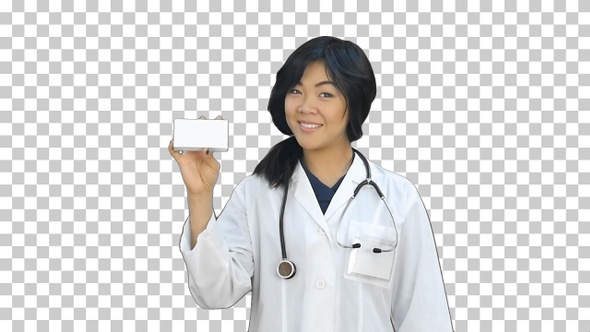 Female doctor holding up a box of tablets, Alpha Channel
