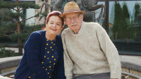 elderly couple feeling happy smiling and looking to camera while relax. Enjoying time lifestyle seni