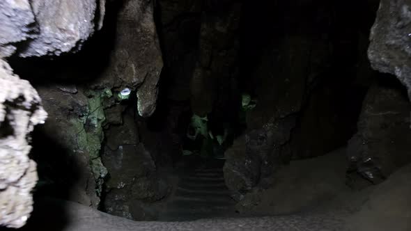 Speleology, cave, dungeon, dark tunnel, underground excavations. alt