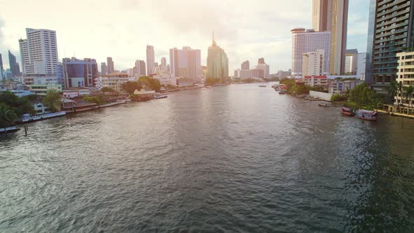 4K UHD : Bangkok River drone view. Flying over the Chao Phraya River alt