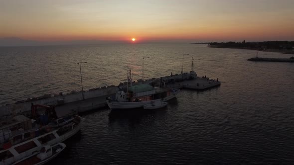 Aerial Seascape with Quay. View at Sunset alt