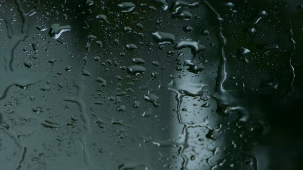 Raindrops Behind Glass