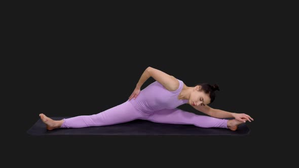 Young Sporty Woman Doing Yoga, Alpha in