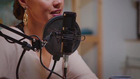 Close Up Talking on Microphone alt