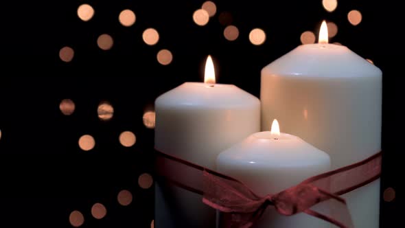 Christmas Candles Burning in Atmospheric Light