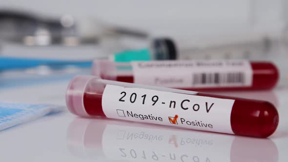 Blood Test Tube with Coronavirus Disease 