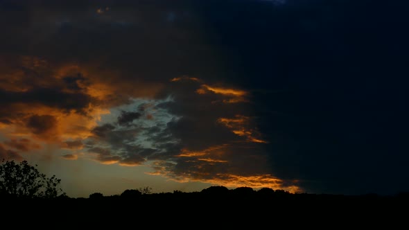 Dark and Brown Clouds Cover the Sky at Sunset