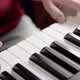 Close up of woman&#39;s hand playing on the electric piano. Female synthesizer player. - VideoHive Item for Sale
