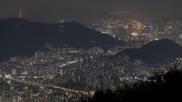 Timelapse Busan City with Buildings By Hills at Bright Night alt