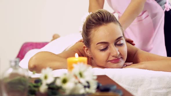 Woman Gets Back Massage Spa By Massage Therapist alt