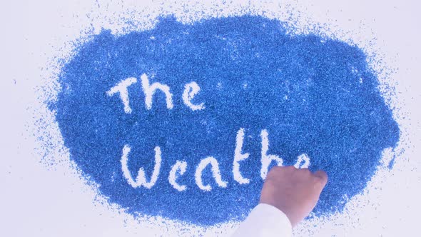 South Asian Hand Writes On Blue The Weather