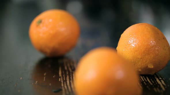 Organic Tangerines On Wood Table