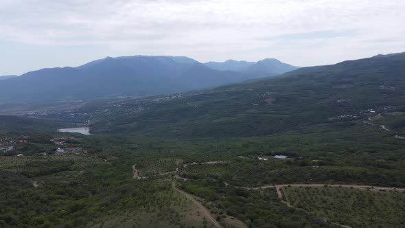 Drone footage of mountains and roads