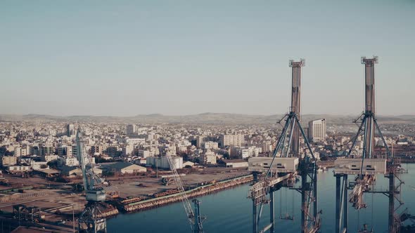 Cargo Docks Cranes in Modern City Water Port or Harbor for Goods Transportation