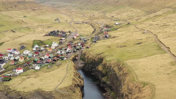 Drone Over Village And Landscape Of Sorvagsvatn Or Leitisvatn alt