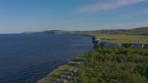 Steep Bank of the River From a Bird's Eye View. Bank of the Volga River in Russia. Aero 