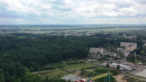 Aerial drone of Klevan town buildings and homes in Rivne Oblast Ukraine. Filmed on a summer day in A alt