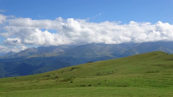 Timelapse scene in valley of national park of Dombay, Caucasus, Russia
