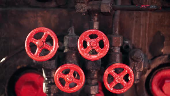 Closeup  Video of Lots of Pipes and Valves on Vintage Pipeline Connected To Steam Boiler in Train alt