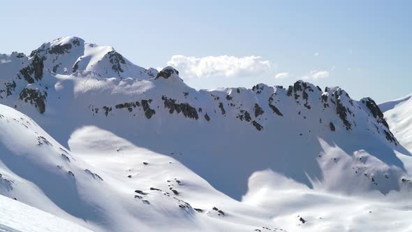 8K Barrier and Embankment Shaped High Imposing Snowy Mountain Ridge Mass