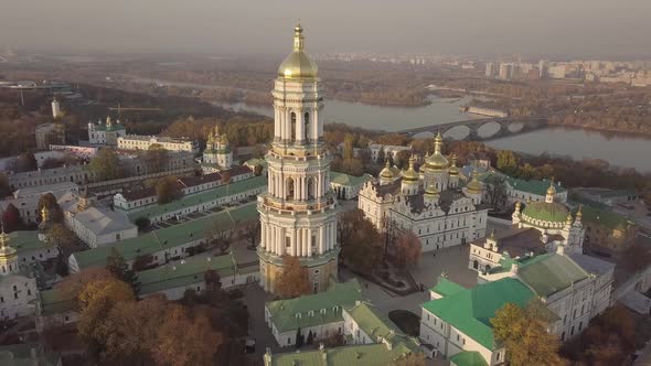 Aerial Kyiv Pechersk Lavra churches and monastery on hills of Dnipro river Ukraine alt