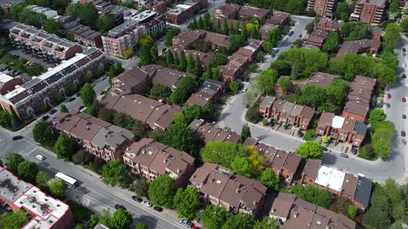 Aerial view by drone of Montreal's neighborhood, residential area, houses and streets alt