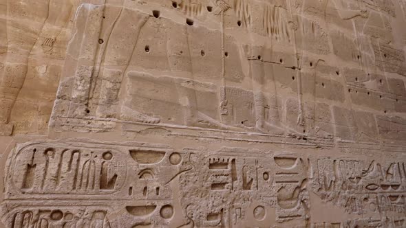 Ancient Drawings On The Walls Of The Medinet Habu Temple alt
