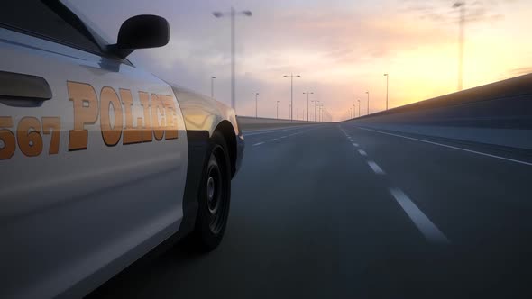 Two police cars chase. The vehicles are involved in the urgent pursuit. alt