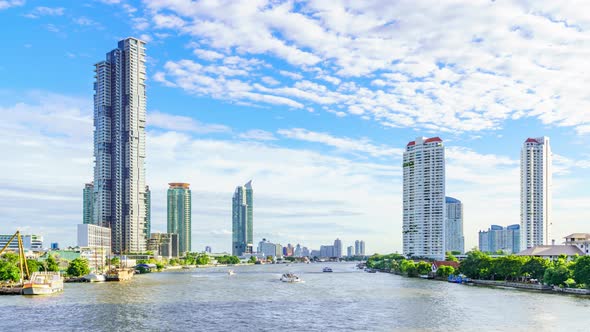 Bangkok city center financial business district, waterfront cityscape during sunny day - Time Lapse