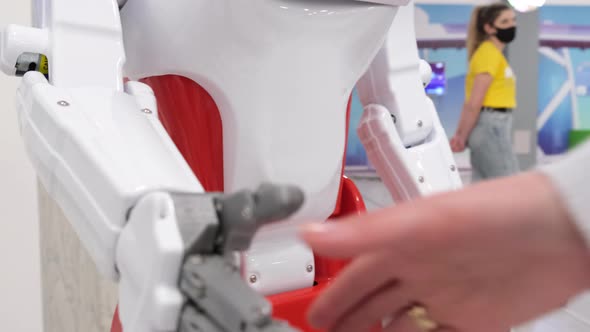 The Robot of the Future Artificial Virtual Intelligence Shakes Hands with Man alt