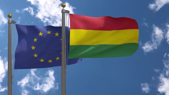European Union Flag Vs Bolivia Flag On Flagpole alt