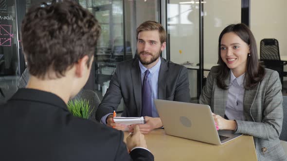 Job Interview with the Employer Businessman Listen to Candidate Answers alt