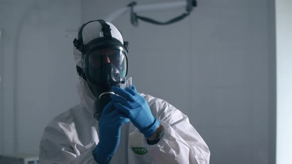 Male Doctor Treats a Patient with Coronavirus Giving Him an Injection alt