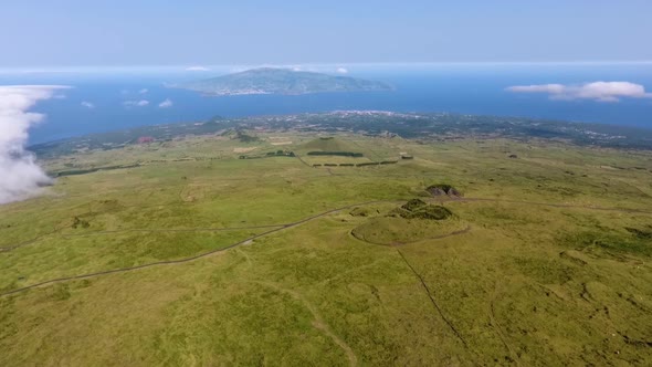 Flying high bove the clouds on the island of Pico in the Azores, Portugal alt