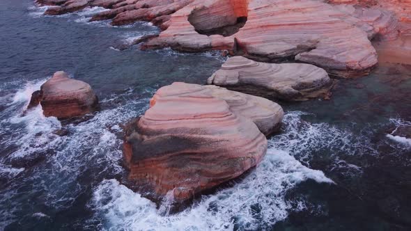 Nature Aerial Landscape Over the Ocean at Sunset or Sunrise Sea Waves on the Unusual Rocky Coast alt
