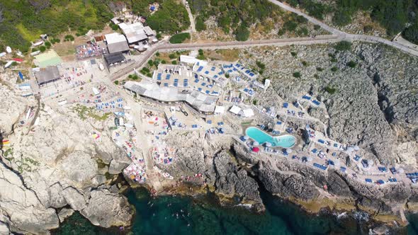 Overhead Aerial View of Lighthouse Beach From Drone in Anacapri Italy in Summer Season alt