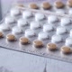 Birth Control Pills on Wooden Background Close Up - VideoHive Item for Sale