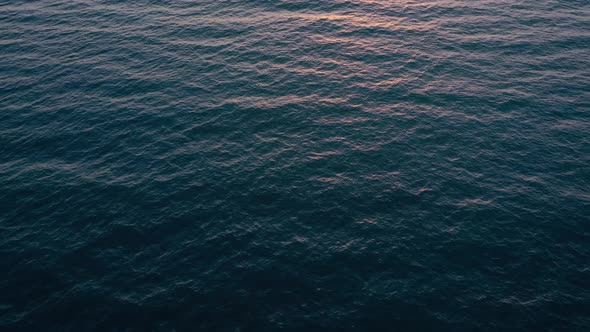Aerial View of Surface of the Atlantic Ocean on the Background of a Beautiful Sunset alt