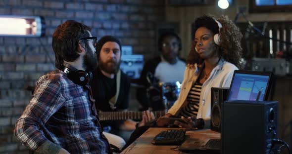 Young Musicians Playing in Home Studio alt