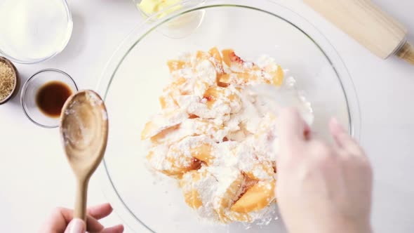 Time lapse. Step by step. Making peach galette with fresh local peaches. alt