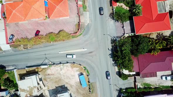 Overhead jib down view of an intersection in the streets of Willemstad, Curacao, Dutch Caribbean isl alt