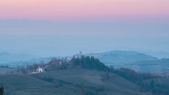 Time lapse: hill landscape at dusk Langhe wine yard region in Piedmont Italy alt