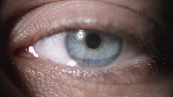 Close Up Macro Shot of a Crying Eye. Young Beautiful Female in Depression. Tears Are Flowing Down alt