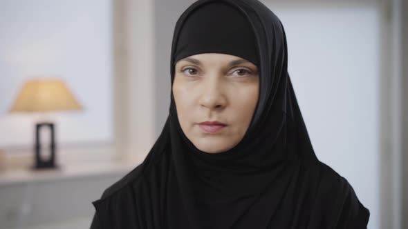 Portrait of Beautiful Muslim Woman Looking at Camera and Gesturing No By Shaking Head. Portrait of alt