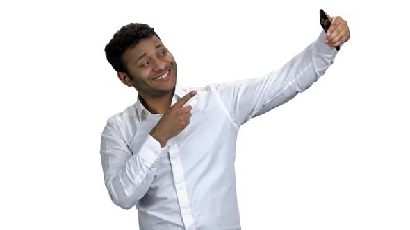 Handsome Businessman Taking Selfie with Mobile Phone alt