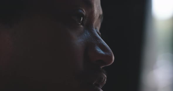 Young man listening and talking close up of eyes alt
